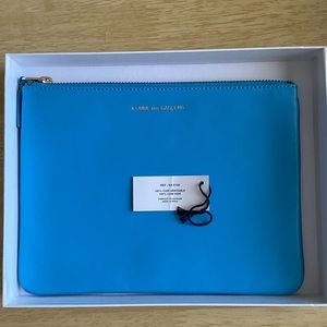 COMME Des GRACONS blue pouch
